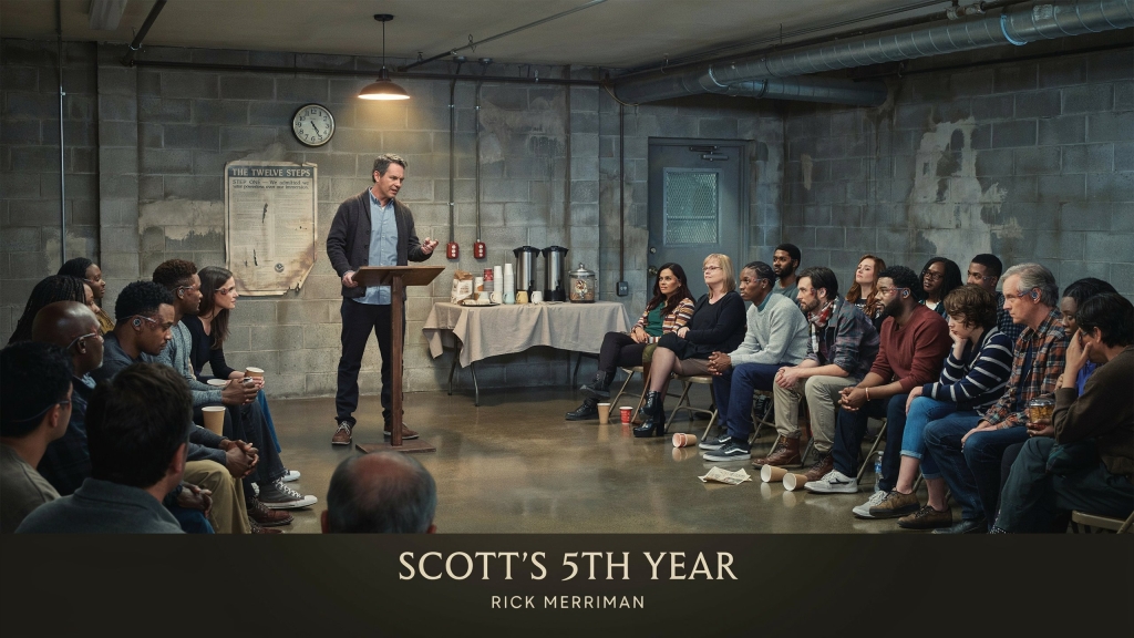 Scott speaking before a virtual recovery meeting where all participants have a data port embedded in their temple